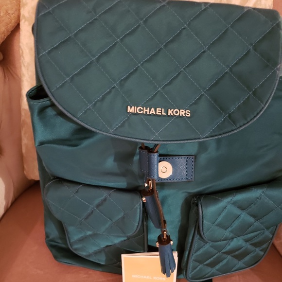 Michael Kors Handbags - Like new! Michael Kors Quilted Green Backpack